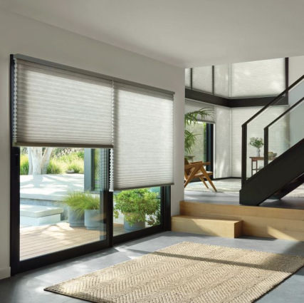 Hunter Douglas Duette® Honeycomb Shades in Aura fabric.