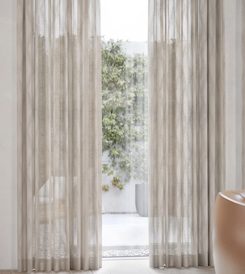 beige window curtains